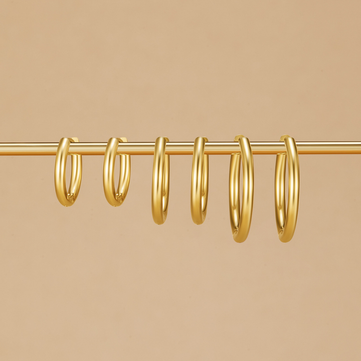 Sett med Tre Ringer Øredobber