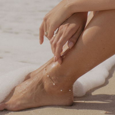 "CALI Øreringer med Perler" could be rewritten as "CALI Perleøreringer".