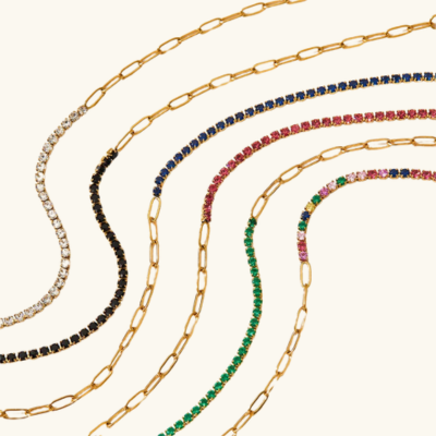 "FAE Set med Spenne og Tennisarmbånd" can be rewritten as "FAE Spenne og Tennisarmbånd Set".