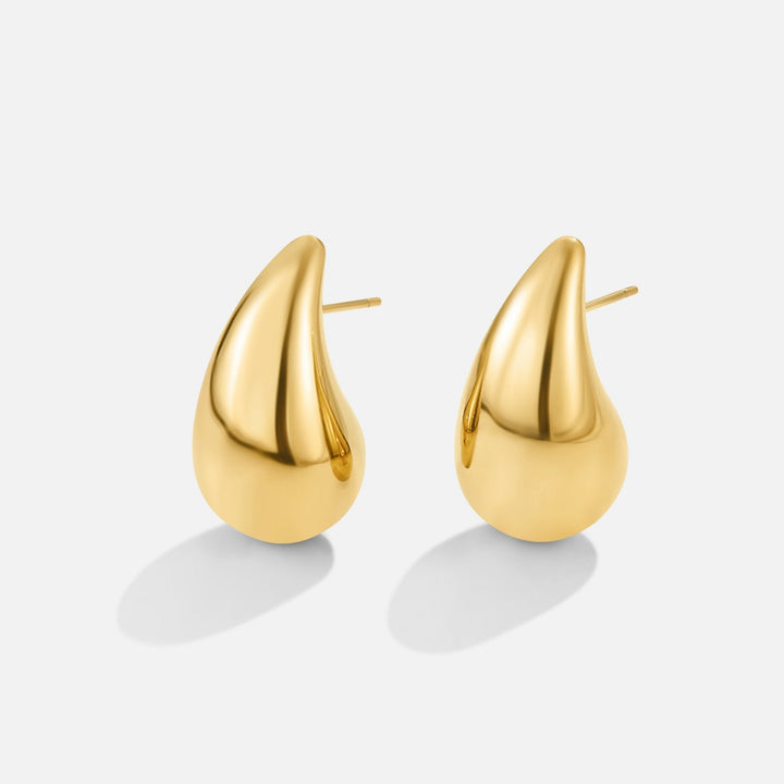 Amara Gull Dråpeøreringer" can be rewritten as "Amara Gold Drop Earrings.
